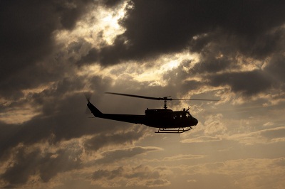 Green Blade helicopter sunset