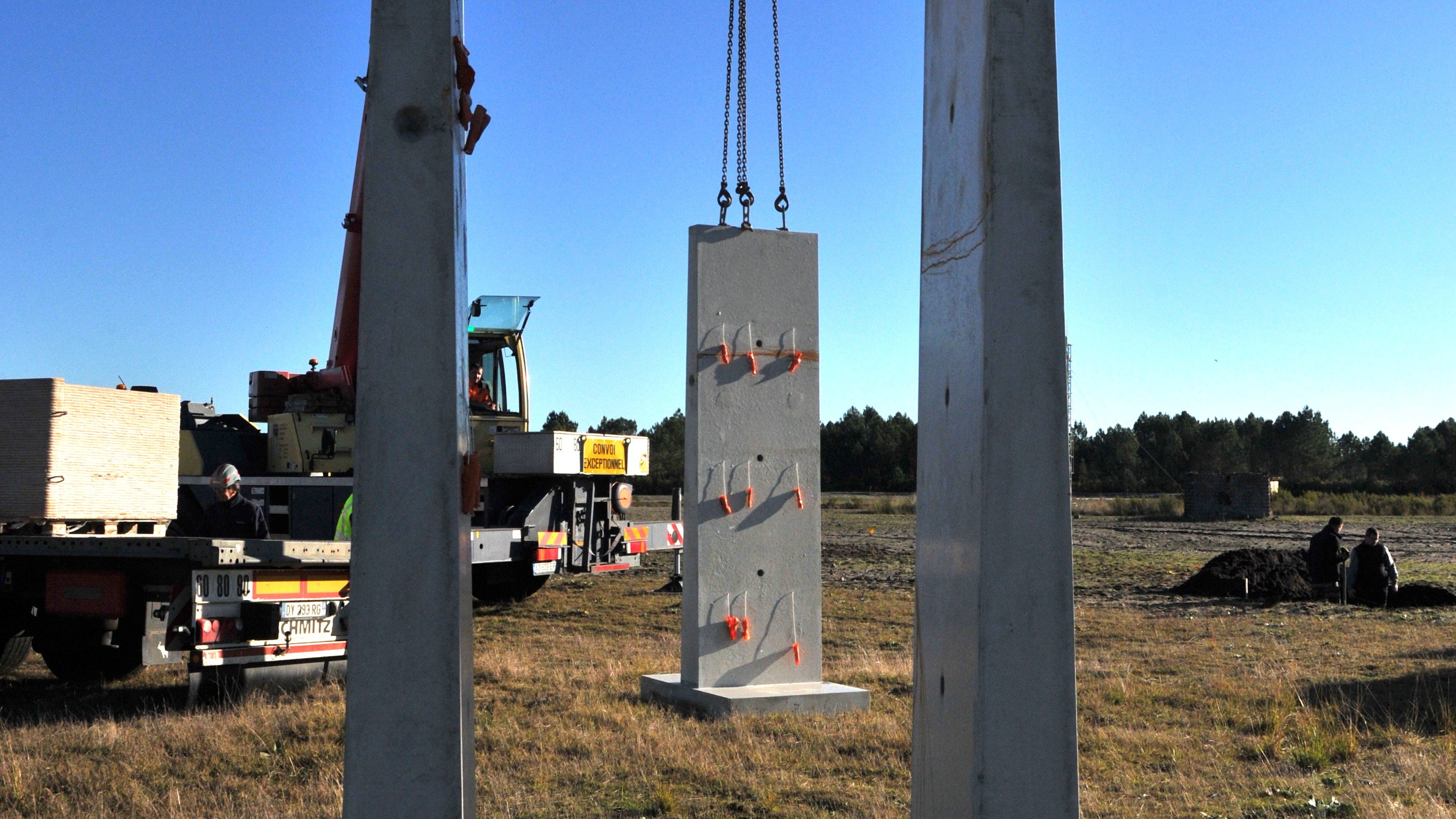 Installing a T-wall at a military shooting range